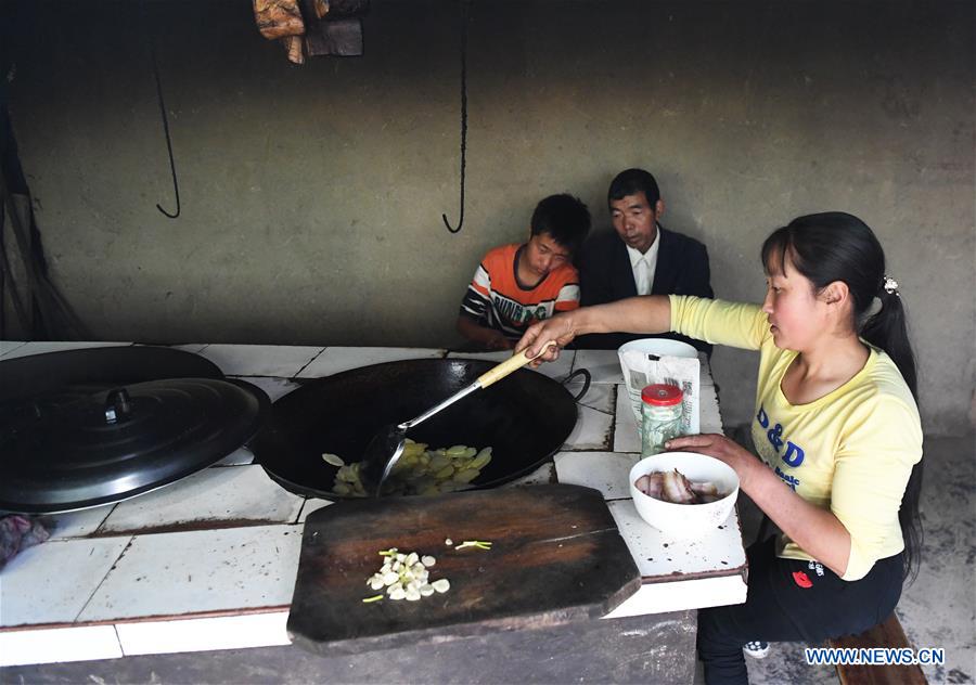 CHINA-CHONGQING-DISABLED FEMALE FARMER (CN)