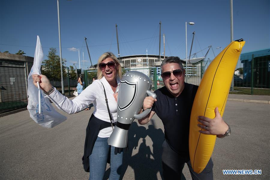 (SP)BRITAIN-MANCHESTER-PREMIER LEAGUE-MANCHESTER CITY-FANS-CELEBRATION