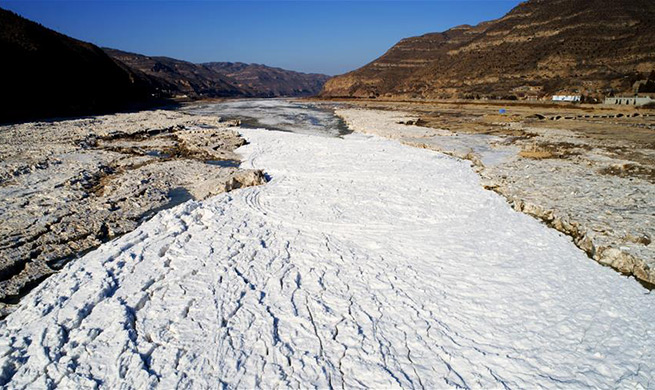 Frozen Hukou Waterfall on Yellow River