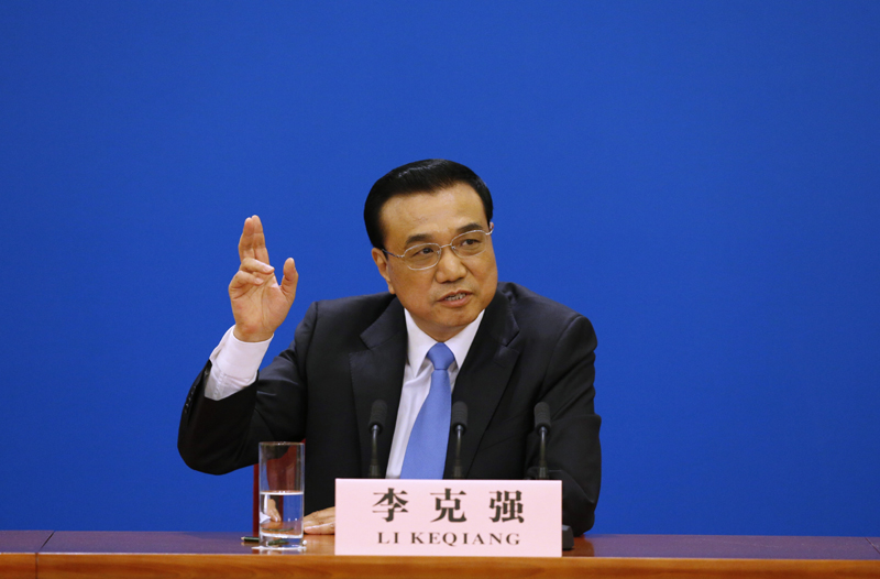 3月15日，國(guó)務(wù)院總理李克強(qiáng)在北京人民大會(huì)堂與中外記者見(jiàn)面，并回答記者提問(wèn)。 新華社記者 沈伯韓 攝