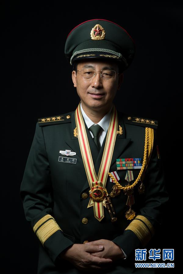 （改革先鋒風(fēng)采&middot;圖文互動）戰(zhàn)斗英雄韋昌進：甘做鋼鐵長城一塊磚