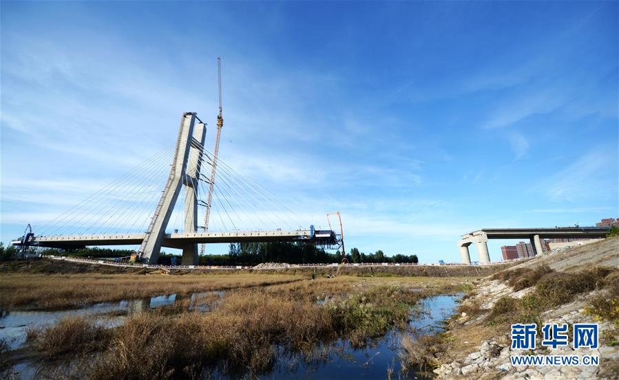 (在習(xí)近平新時(shí)代中國特色社會(huì)主義思想指引下——新時(shí)代新作為新篇章·圖文互動(dòng))(1)梗阻的“血脈”通了 彼此的心拉近了——京津冀“斷頭路”打通記