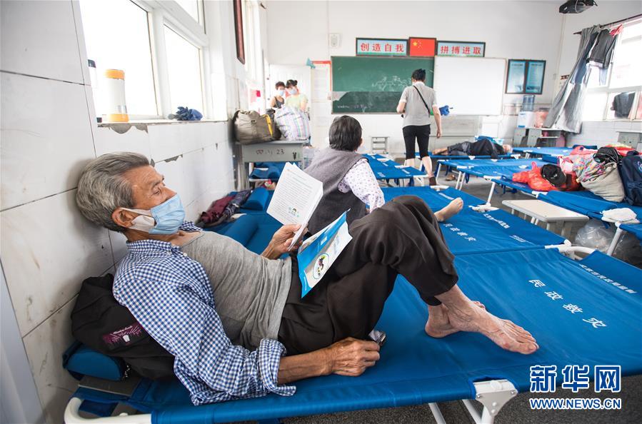 （在習(xí)近平新時代中國特色社會主義思想指引下——新時代新作為新篇章·習(xí)近平總書記關(guān)切事·圖文互動）（5）戰(zhàn)疫魔,斗洪魔——湖北全力應(yīng)對防疫、防汛疊加“雙考”