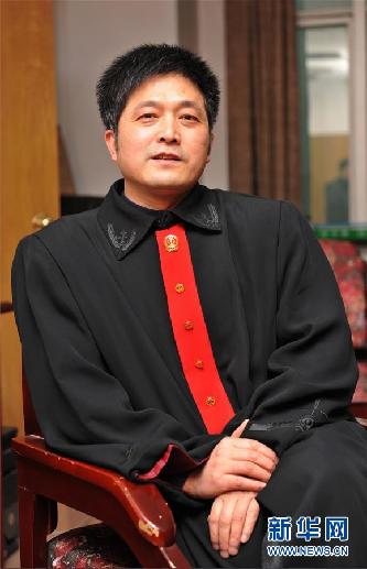 （圖文互動(dòng)）其人如蘭，既潔且馨——追記“全國(guó)模范法官”胡國(guó)運(yùn)