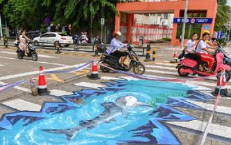 &ldquo;海洋世界&rdquo;3D立體斑馬線亮相?？? />  
<div>“海洋世界”3D立體斑馬線亮相海口</div>
</a> 
</div>
<div   id=