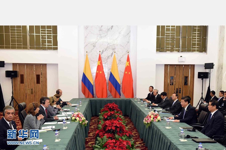 11月18日，國家主席習(xí)近平在菲律賓馬尼拉會見哥倫比亞總統(tǒng)桑托斯。 新華社記者 饒愛民 攝