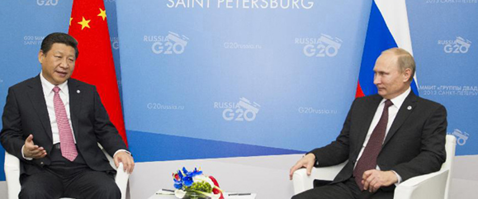 2013年9月，習近平會見俄羅斯總統(tǒng)普京